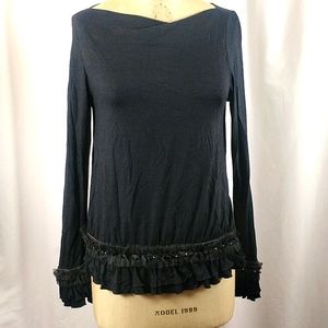 Boatneck top with ruffles hem and sleeves